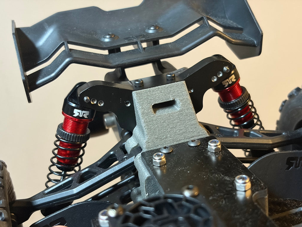 Shock Tower Set detail photo showing machined aluminum finish