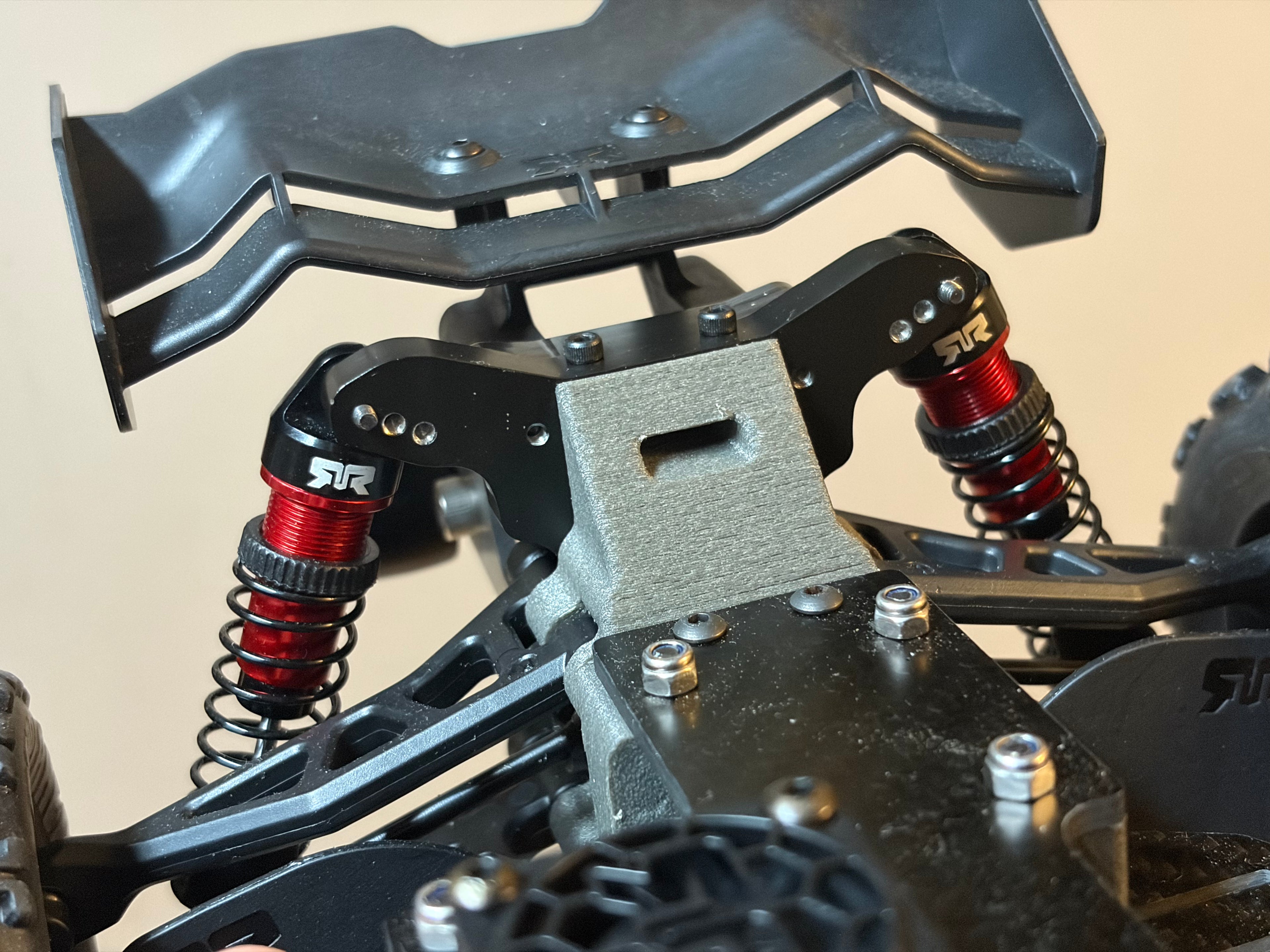 Shock Tower Set detail photo showing machined aluminum finish